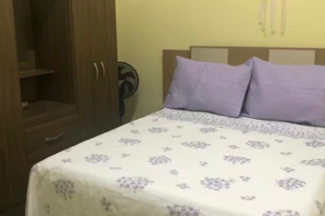 Cama e armário em quarto de imóvel comercial e residencial localizado no centro histórico de Lençois Chapada Diamantina
